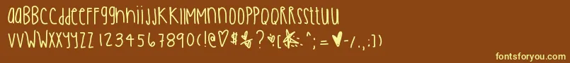 Olivertwist Font – Yellow Fonts on Brown Background