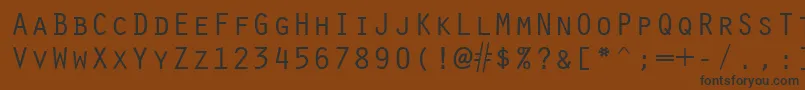 フォントOracle – 黒い文字が茶色の背景にあります