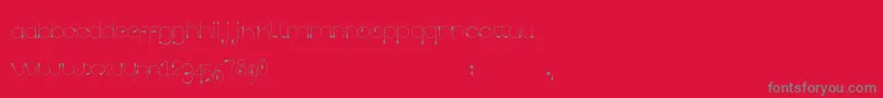 フォントTropfen – 赤い背景に灰色の文字
