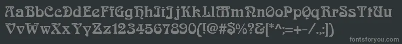 ArnoldboecklinExtrabold-fontti – harmaat kirjasimet mustalla taustalla
