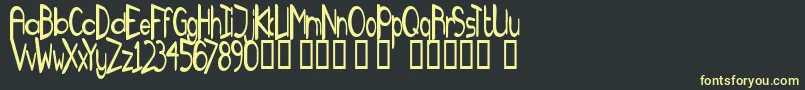TmFanzineFameNormal Font – Yellow Fonts on Black Background