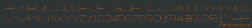 TrooklernRegular-Schriftart – Braune Schriften auf schwarzem Hintergrund