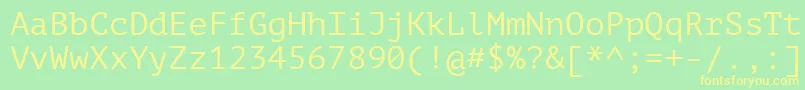 Ptm55f Font – Yellow Fonts on Green Background