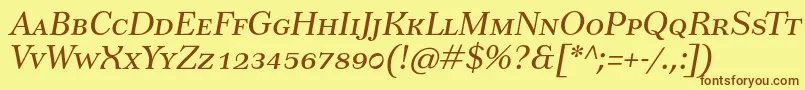 Czcionka TusarscItalic – brązowe czcionki na żółtym tle
