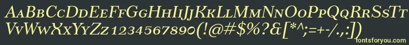 フォントTusarscItalic – 黒い背景に黄色の文字
