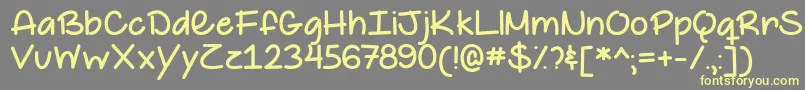 TheHappyGiraffeDemo Font – Yellow Fonts on Gray Background