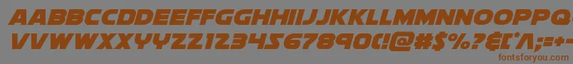 フォントSoloistital – 茶色の文字が灰色の背景にあります。