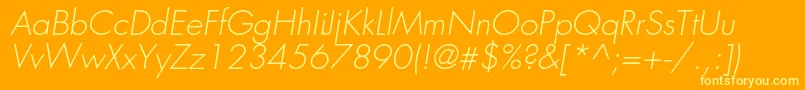 Czcionka FavoritlightcItalic – żółte czcionki na pomarańczowym tle