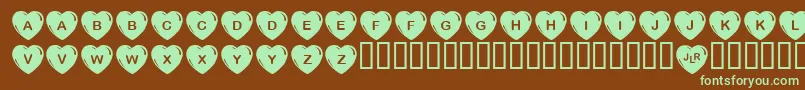 JlrSimpleHearts Font – Green Fonts on Brown Background