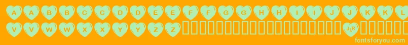 JlrSimpleHearts Font – Green Fonts on Orange Background