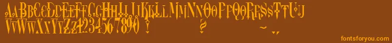 フォントDreamscar – オレンジ色の文字が茶色の背景にあります。
