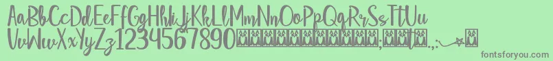 StarStrella Font – Gray Fonts on Green Background