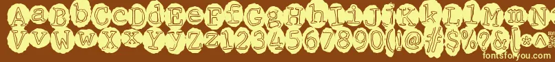 Meltingrecords Font – Yellow Fonts on Brown Background