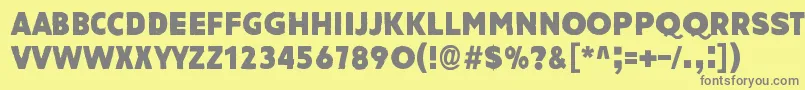 フォントAmateurNaked – 黄色の背景に灰色の文字