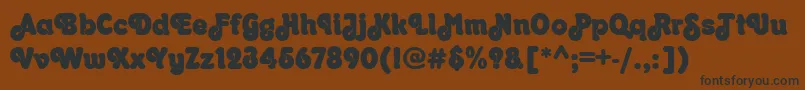 OrkneyRegular-fontti – mustat fontit ruskealla taustalla