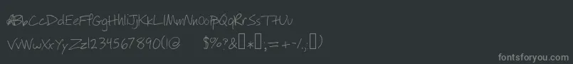 Fonte Willyjhandwriting – fontes cinzas em um fundo preto