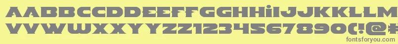 Indigodemonexpand Font – Gray Fonts on Yellow Background