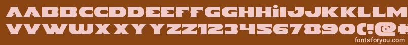 Indigodemonexpand Font – Pink Fonts on Brown Background