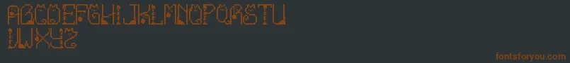 Шрифт LmsCatTreats – коричневые шрифты на чёрном фоне