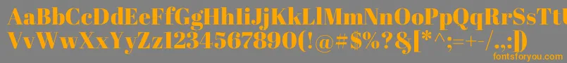 AbrilFatface-Schriftart – Orangefarbene Schriften auf grauem Hintergrund