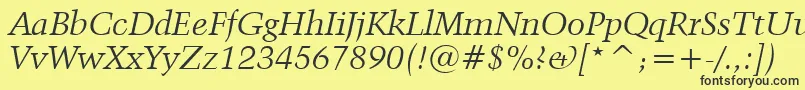 Kuenstler480ItalicBt Font – Black Fonts on Yellow Background