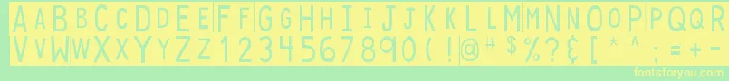 DjbStickyTapeLabels Font – Yellow Fonts on Green Background