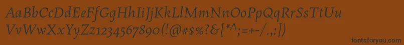 MaiolaproItalic-fontti – mustat fontit ruskealla taustalla