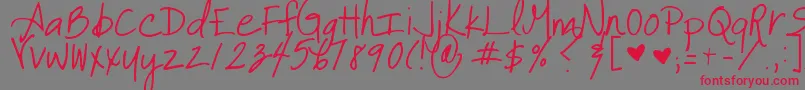 It Font – Red Fonts on Gray Background