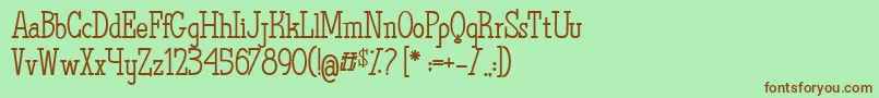 TheQuestOfDiscoveries Font – Brown Fonts on Green Background