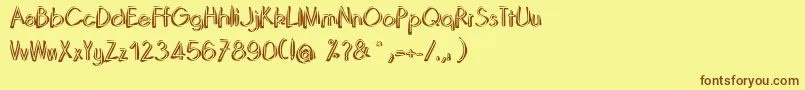 フォントDominoRegular – 茶色の文字が黄色の背景にあります。