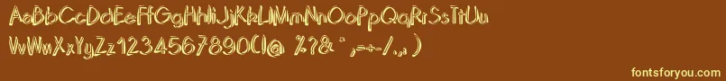 DominoRegular-fontti – keltaiset fontit ruskealla taustalla