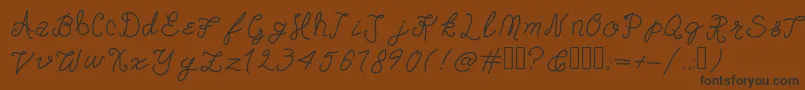 フォントDoorknobDaydreams – 黒い文字が茶色の背景にあります