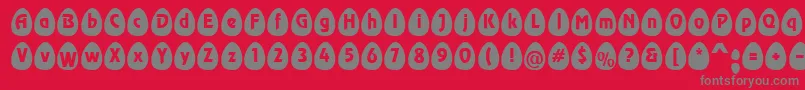 EggsblackBecker-Schriftart – Graue Schriften auf rotem Hintergrund