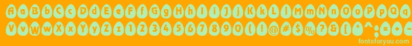 EggsblackBecker-Schriftart – Grüne Schriften auf orangefarbenem Hintergrund
