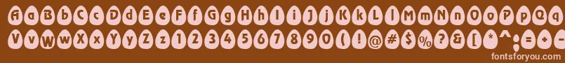 EggsblackBecker-fontti – vaaleanpunaiset fontit ruskealla taustalla