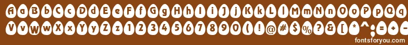 EggsblackBecker-fontti – valkoiset fontit ruskealla taustalla