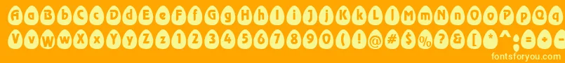 フォントEggsblackBecker – オレンジの背景に黄色の文字