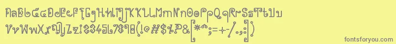 フォントCyclin ffy – 黄色の背景に灰色の文字
