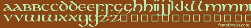 フォントKellsUncialBold – 緑色の文字が茶色の背景にあります。