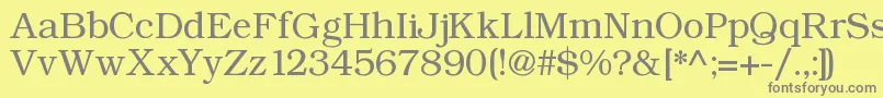 フォントAngltrr – 黄色の背景に灰色の文字