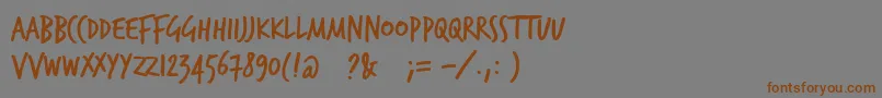 Trashhandフォントについての詳細 フォントTrashhand – 茶色の文字が灰色の背景にあります。