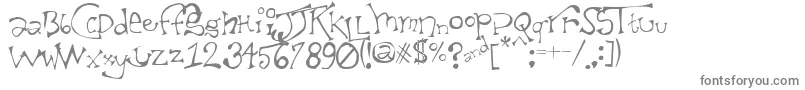 TaxidermistIi-fontti – harmaat kirjasimet valkoisella taustalla