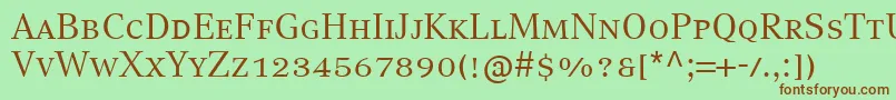 フォントCompatilTextLtComRegularSmallCaps – 緑の背景に茶色のフォント