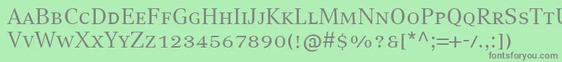 フォントCompatilTextLtComRegularSmallCaps – 緑の背景に灰色の文字