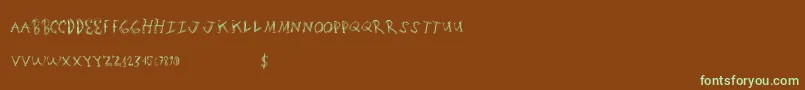 フォントScratchingmatters – 緑色の文字が茶色の背景にあります。
