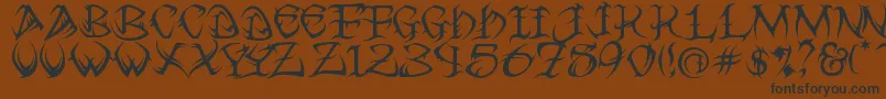 Tribal ffy-Schriftart – Schwarze Schriften auf braunem Hintergrund