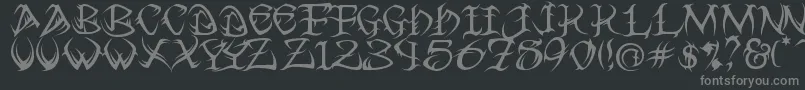 Tribal ffy-fontti – harmaat kirjasimet mustalla taustalla