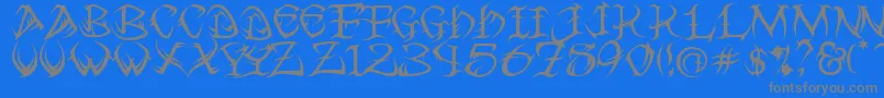 フォントTribal ffy – 青い背景に灰色の文字