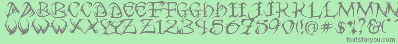 フォントTribal ffy – 緑の背景に灰色の文字