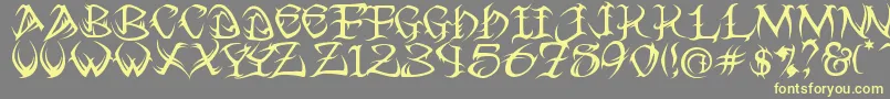 フォントTribal ffy – 黄色のフォント、灰色の背景